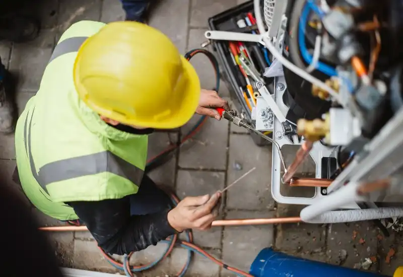 Technician Working on Residential Electrical Repairs